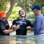 College Football Players ‘Praise Jesus’ as They Get Baptized in Historic Mossy Creek