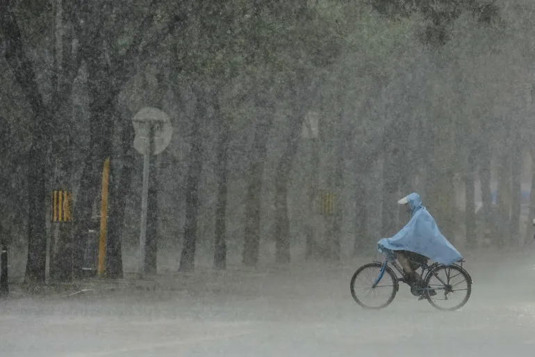 Heavy rains kill four in China as flood warnings issued in 11 provinces