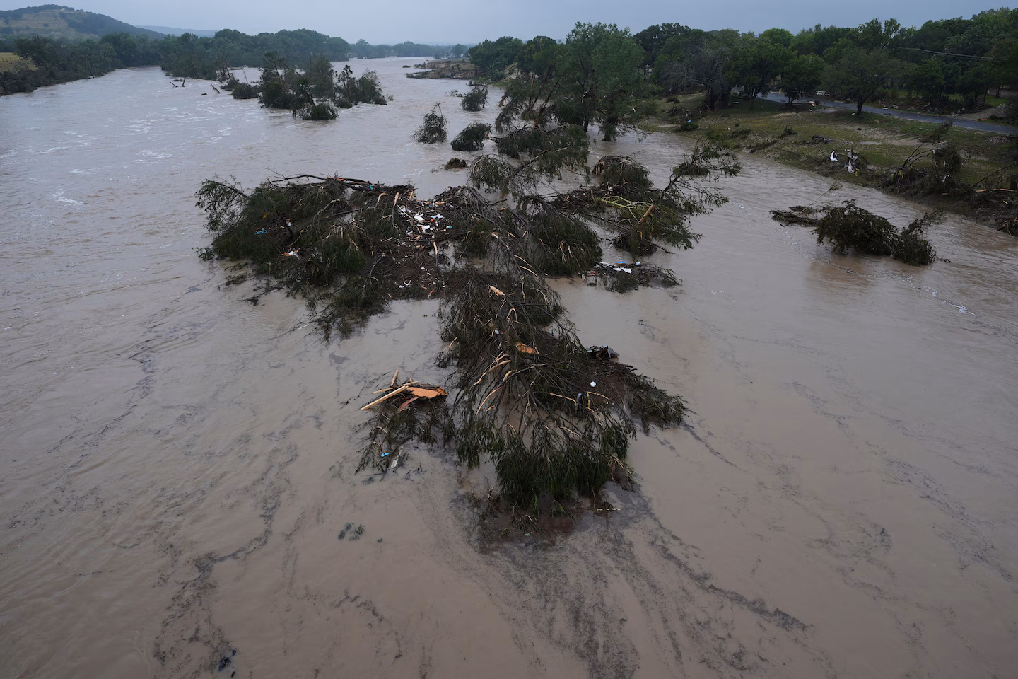 At least 24 dead, children still missing after flooding in Texas, sheriff says
